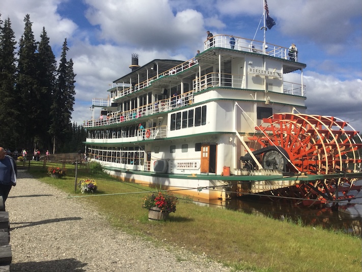 A riverboat floating in the river