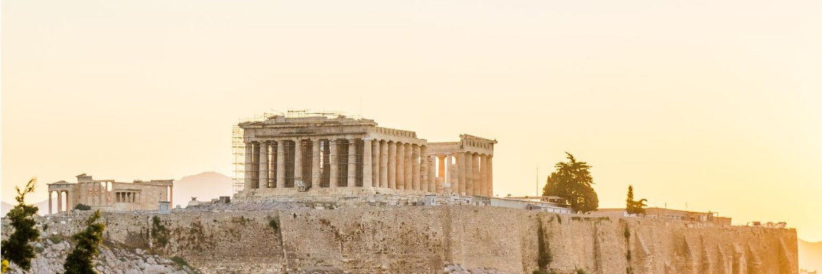The Parthenon on the Acropolis in Athens, Greece, at sunset.